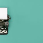 top view retro black typewriter with paper header with text space