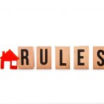 House Rules - block letters with red home / house icon with white background