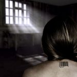 The concept of trafficking in people with a naked female back and barcode